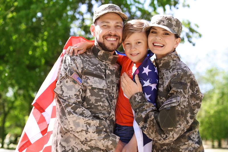 happy military family their son outdoors